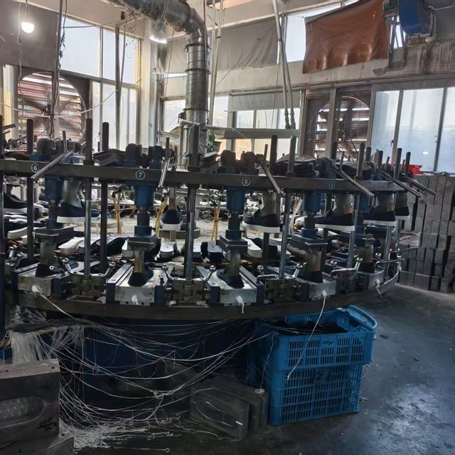 Lasting machine in operation